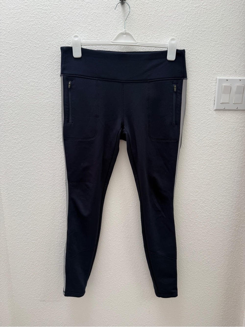 Athleta Navy Fleece-Lined Leggings with side stripe